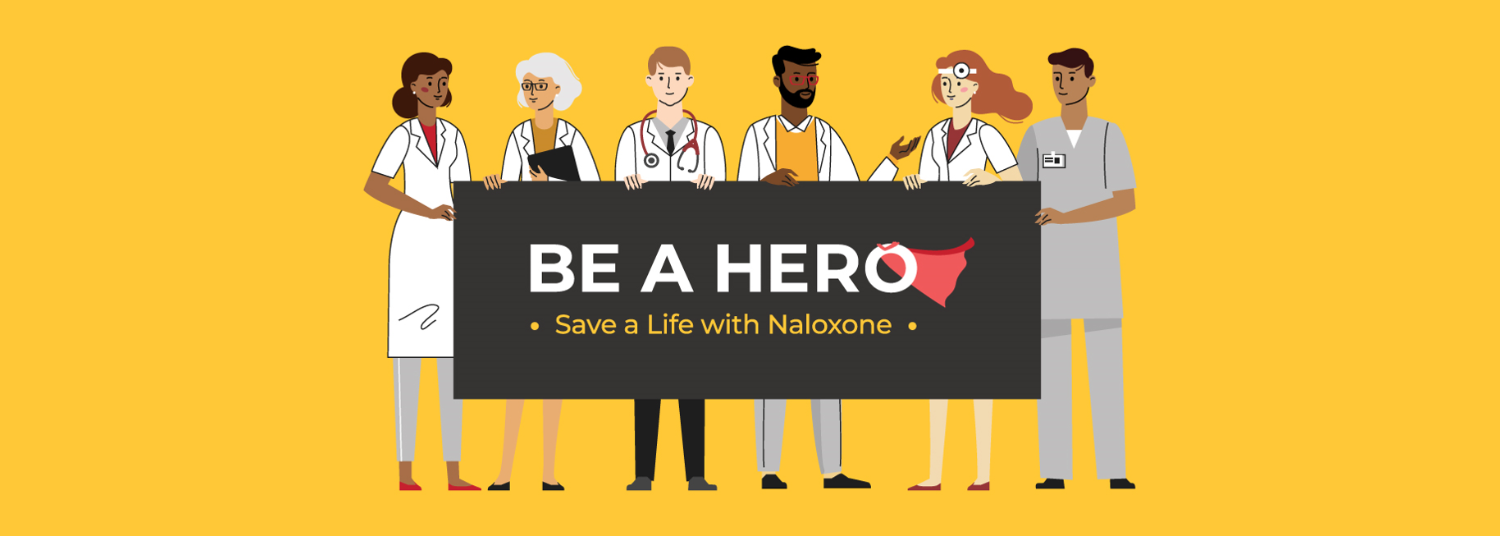 Doctors holding a "Be A Hero" banner.