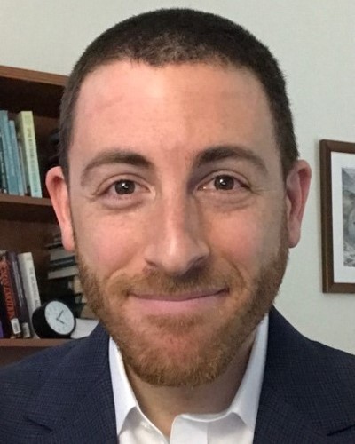 headshot of Ben Israel smiling