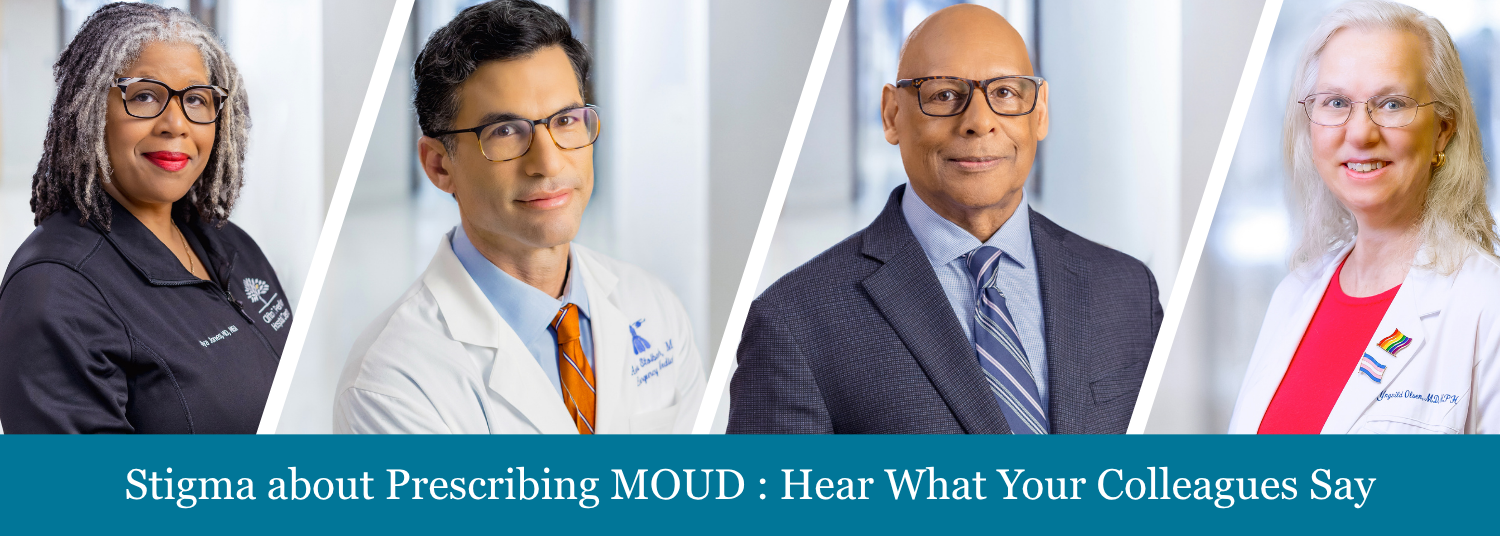 Four doctors looking directly at camera 